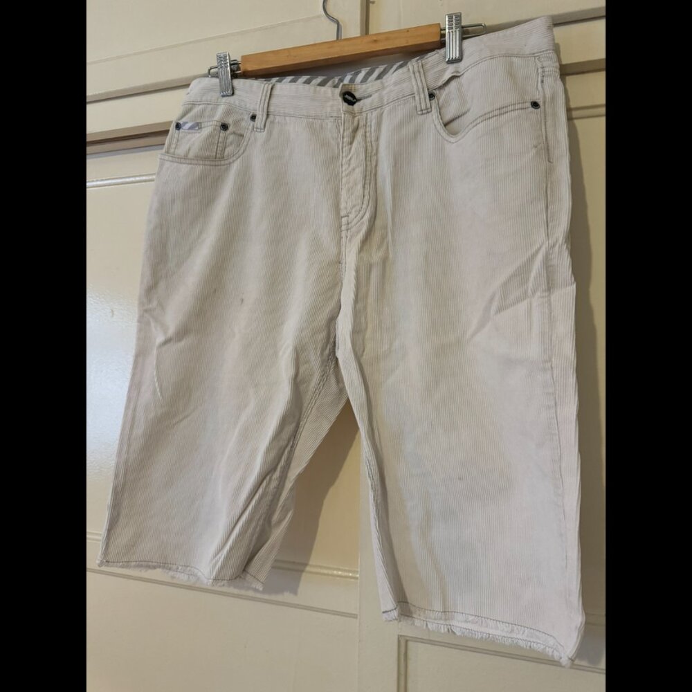 Modern Amusement light grey button-fly distressed cutoff corduroy shorts (34)